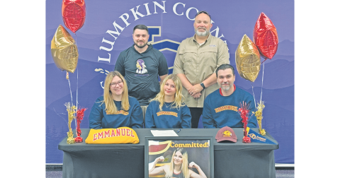 Gaby Luper signed her college commitment surrounded by her family and coaches.
