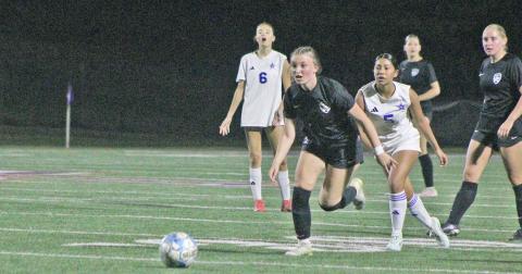 Dakota Atnip runs down a ball during a game this season.