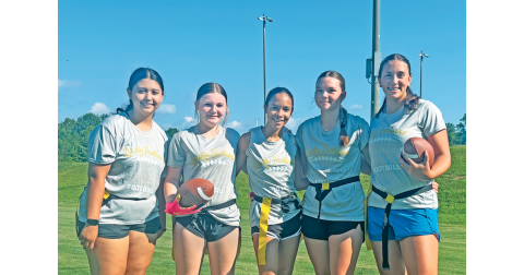 Lumpkin football athletes Gabriela Frausto, Haven Lingerfelt, Mary Meadows, Annalee Gilbert and Kylie Schubert gather for a quick photo during last week’s practice.