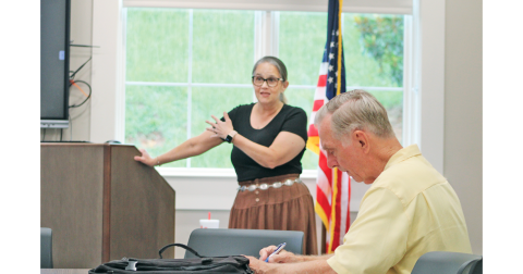 A local resident takes notes as Anita Anderson Spangler with Citizens for a Free Lumpkin speaks during a recent Homestead Property Tax Relief Seminar held in the library’s meeting room.