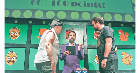 Contestants face off in a heated buzzer battle during Planet Acorn’s The Game Show Dahlonega.