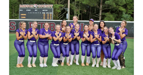 The Lady Indians celebrate their win over The Tigers on Dawson County’s field.