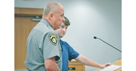 Lumpkin County Sheriff Stacy Jarrard reveals new efforts to regulate the Flock License Plate Reader system during a recent Board of Commissioners meeting, as surveillance opponent Robbie Ward looks on.
