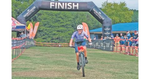 Amelia Turk crosses the finish line in 6th place—her season best—and a crucial performance to earn the team a 3rd place finish out of 23 Division I teams. (Submitted photo)