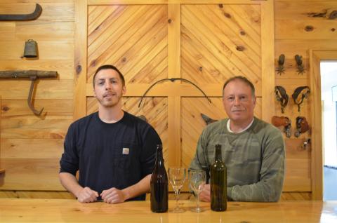 Lane Williams and Lloyd Allison stand behind the bar in the tasting room for Tesnatee River Winery and Meadery. (Photo/Stephanie Hill)