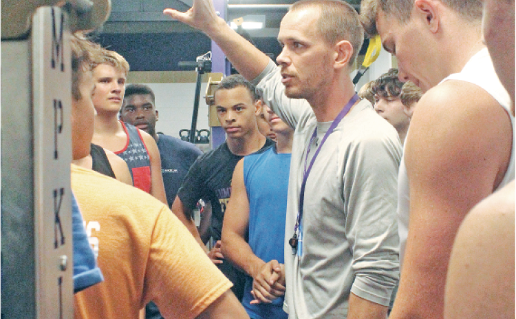 Caleb Sorrell calls a huddle with the team.