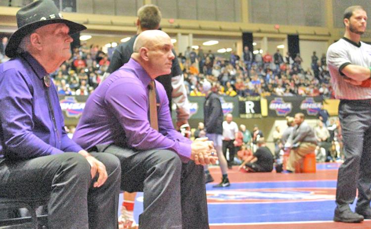 LCHS head wrestling coach Sean Hage (pictured here with LCHS assistant coach Ed Wright on the left) believes that the rules changes the NFHS made recently were a step in the right direction.