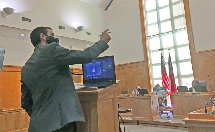 University of North Georgia astronomy assistant professor Dr. Gregory Feiden shares possible solutions to local light pollution during a presentation to the city council.