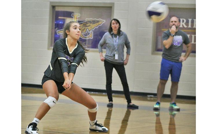 ABOVE: Senior Isabel Davenport’s defensive play has helped her squad all season. She leads the team with 123 digs.