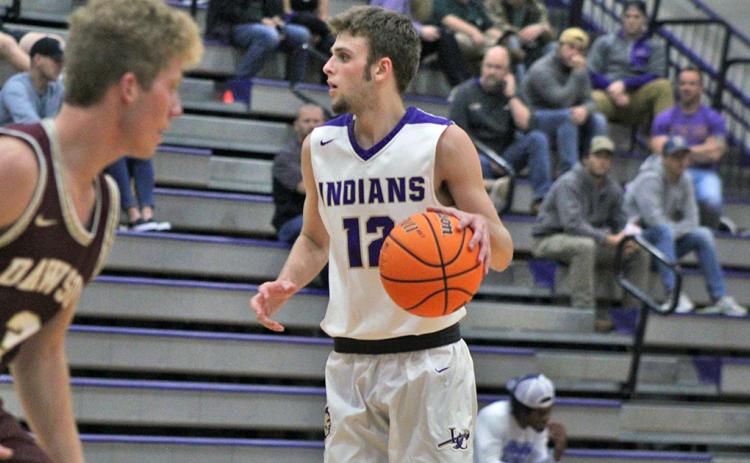 Lumpkin’s Chandler Pulley looks to find an open teammate in Friday’s game against Dawson County.