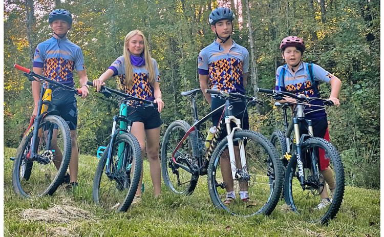 From left, Cru Norton, Shiloh Claussen, Connor Bagley and Devin White represented Gold City Composite on race days this fall in the new mountain bike team’s inaugural season racing in the Georgia Interscholastic Cycling League in 2020.