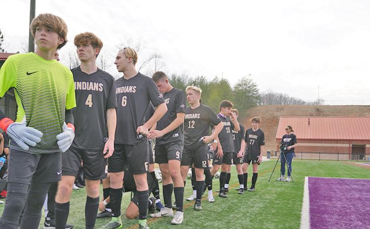 The Lumpkin County High School Varsity Boys Soccer team lines up to take the field against North Hall on Friday. Led by freshman Brauner Boegner (left) in goal, the Indians kept the clean sheet against the Trojans, holding on for a 1-0 win.