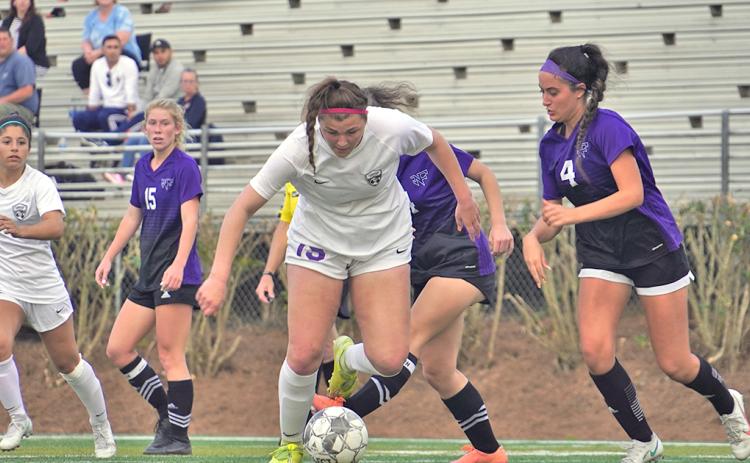 LCHS Reagan Spivey frustrated the North Forsyth defense all night, powering through the defense and driving the ball into the attacking third.