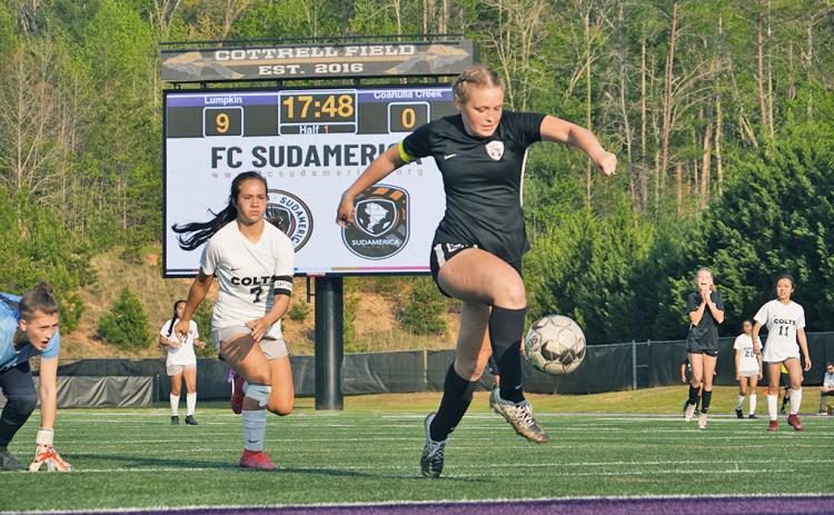 Already past the backline and goal keeper, Cassidy Fuller settles the ball before sending it through the net for the mercy-rule clinching 10th goal of the day as the Indians dismantled Coahulla Creek in their first round playoff game.