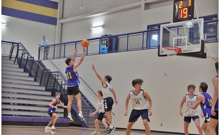 Rising Lumpkin senior Jones Harris takes a shot during the Indians’ recent Shot Clock League game versus Lakeview. Both LCHS basketball teams have competed in several games with the newly implemented shot clock rules in order to be ready for this season.