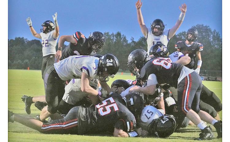 LCHS senior lineman Ricky Hicks plows ahead for two yards and the touchdown on a crucial fourth down play during the Indians’ scrimmage against Lakeview Academy on Friday. Head Coach Caleb Sorrells said his team starts and ends with the play of his veteran line this season, as the entire starting line from last season returned to the team in 2021.