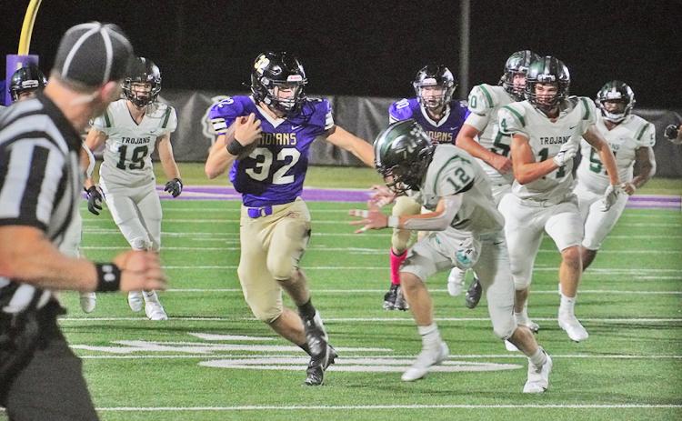 Lumpkin sophomore Mason Sullens avoids would-be tacklers with a huge run for Lumpkin’s longest play of the night before eventually punching the ball in for the Indians’ lone score against North Hall.