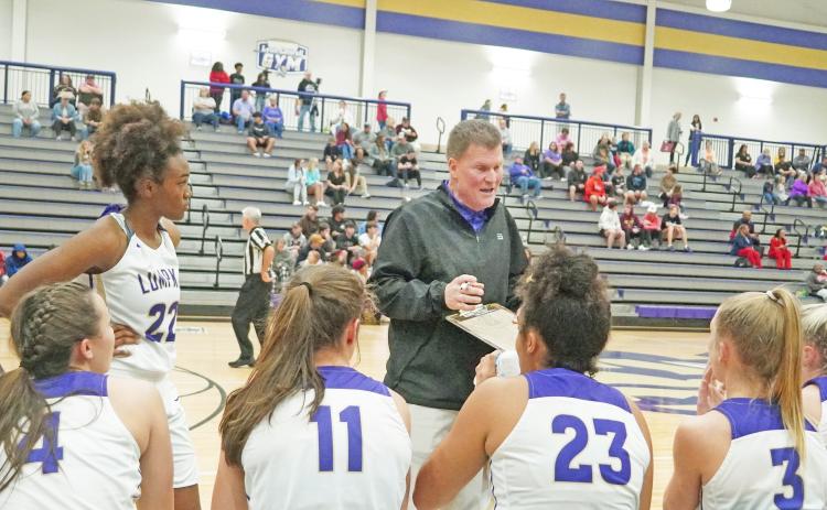 Lumpkin County High School’s now former head coach David Dowse addresses his team during a timeout in its season opener on Thursday, Nov. 18. According to principal Billy Kirk, the plan is to get through this week and into Thanksgiving break before likely announcing an interim coach on Monday, Nov. 29.