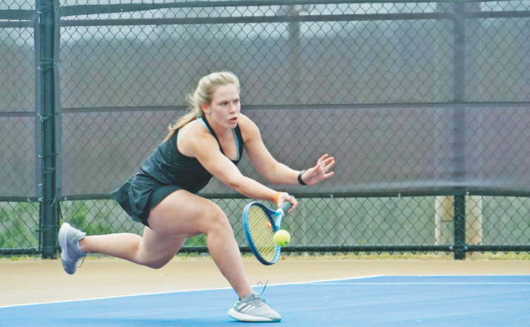 Cady Geddings lunges forward to return a volley during Lumpkin’s 7 AAA Region Tournament. Geddings won the final match of the tournament for the Indians to clinch a third place finish in the region.