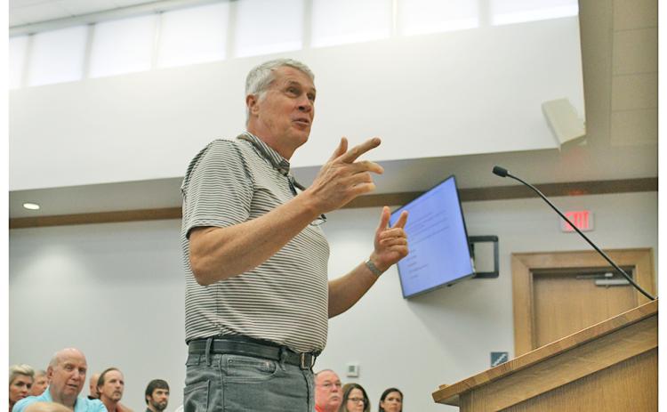 Tom Kuipers moved to Lumpkin County a few years ago in part because the Aquatic Center was in the works. Speaking at the county’s heavily attended work session on Tuesday, Kuipers was one of about 12 members of the public that came before the board to give their concerns with the newly proposed pool plan.