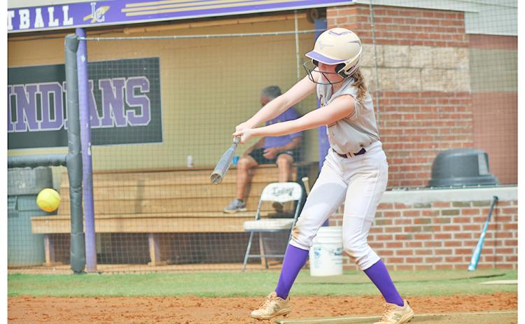 Lumpkin softball’s Sydney Moore works on her two-strike approach at the plate during a recent June practice.
