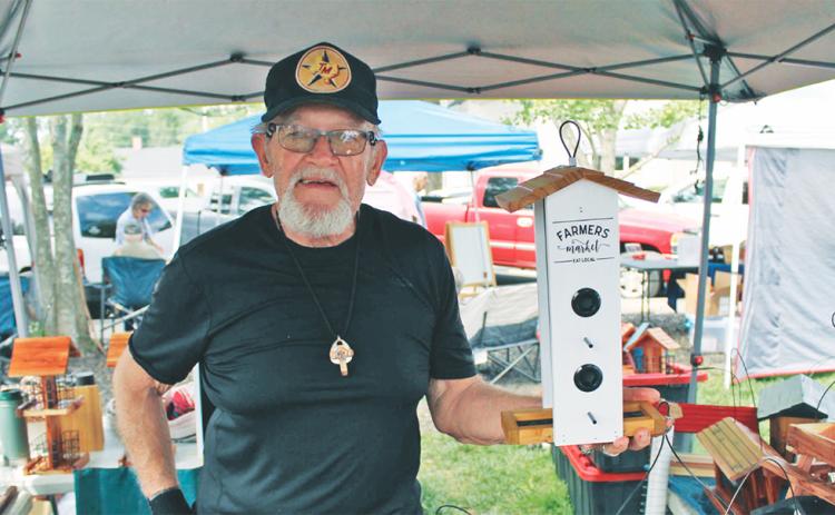 Tim ‘Birdman’ Porter explains how he creates birdhouses and how he considers his experience with Art in the Park to be some of the best times he has ever had.