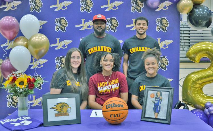 Kate Jackson celebrates her scholarship signing along with (front row, left) mother Janet Jackson, sister Keira Jackson, (back row) dad Patrick Jackson and brother Pat Jackson.