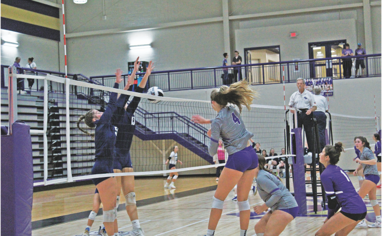 Outside hitter Morgan Powell spikes one home as Lumpkin battles White County last week. The Indians fell to White County, but defeated West Hall during Senior Night.
