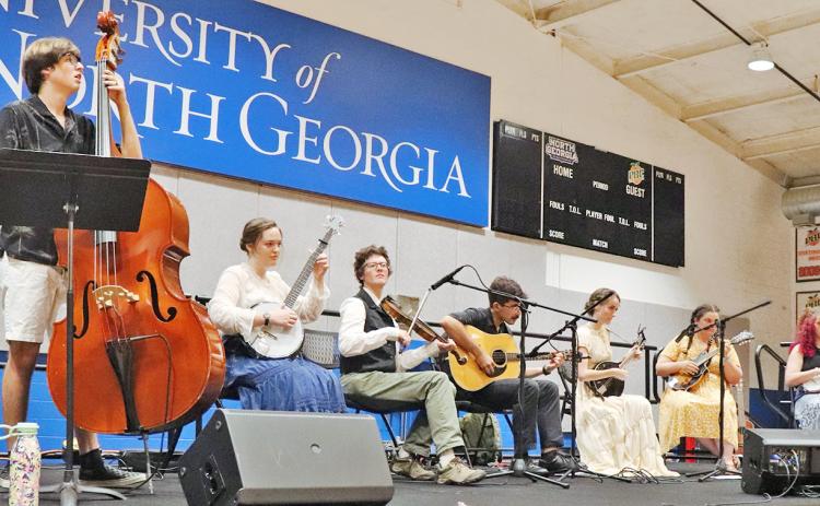 The members of the Licklog String Band perform at a spring contra dance at the University of North Georgia. (Photo by Sharon Tran)