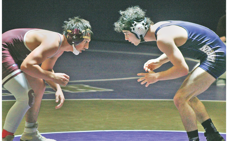 Wrestler TJ Payne takes on his Dawson County opponent during Lumpkin’s home meet last week.