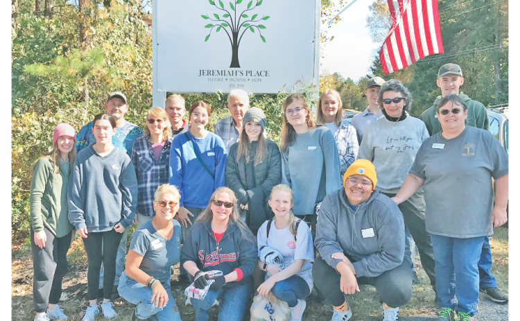 Jeremiah’s Place members and volunteers gathered for a volunteer day event.