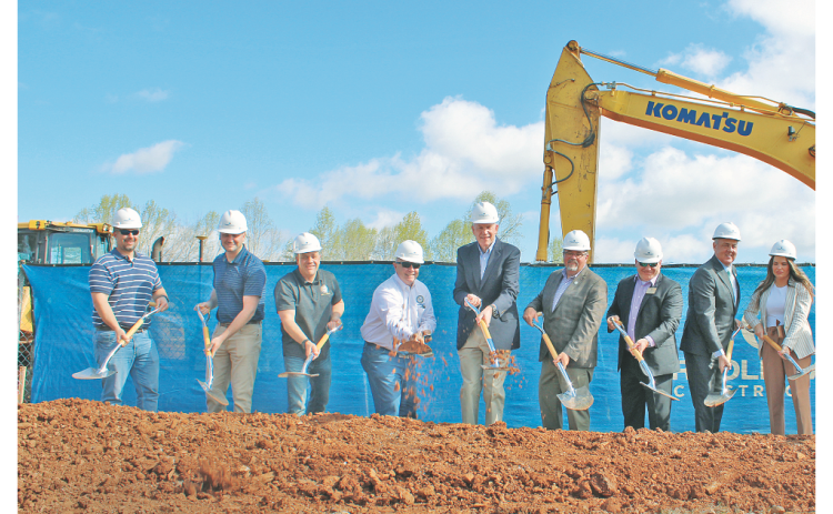 Some of the officials in attendance at the aquatic center groundbreaking March 24 included (from left) Carroll Daniel Senior Project Manager Brandon Harmon, Commissioner Rhett Stringer, Commissioner Jeff Moran, Commissioner Bobby Mayfield, County Manager Alan Ours, Chairman Chris Dockery, School Superintendent Rob Brown, Senator Steve Gooch and Parks & Rec Advisory Board Chair Brooke Smith.