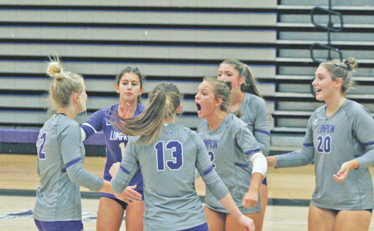 The Lumpkin County team was fired up after taking a set two victory over Gainesville High School.