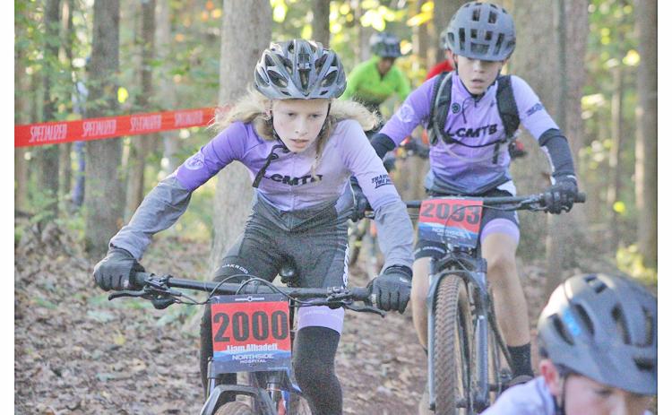 Liam Alhadeff races through the course on his way to a first place finish.