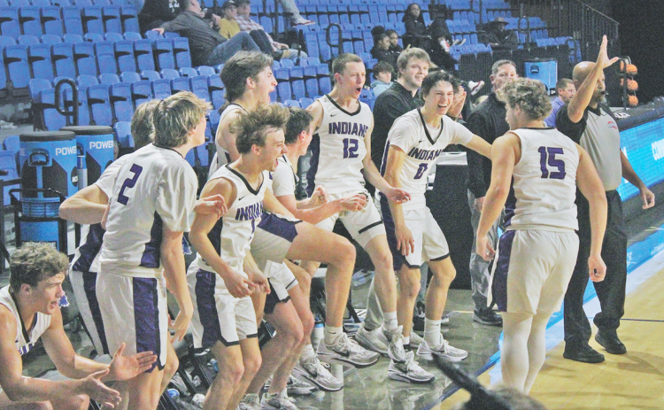 Lumpkin County players celebrate a score on the UNG home court during their game against Commerce on Saturday.