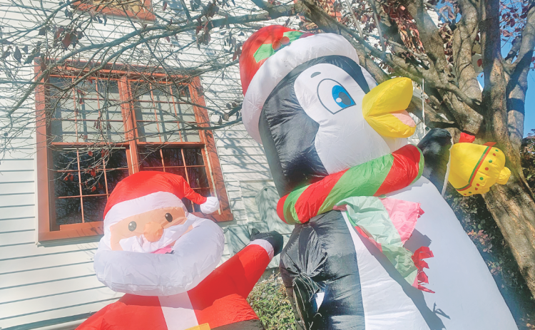 Dahlonega ordinances dictate that inflatables are not allowed within the city limits. That includes Santa and a holiday penguin outside of Shenanigans Irish Pub.