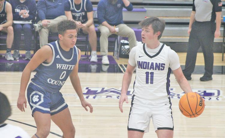 Lumpkin County's Jac Chambers looks for an opening against the Warriors.