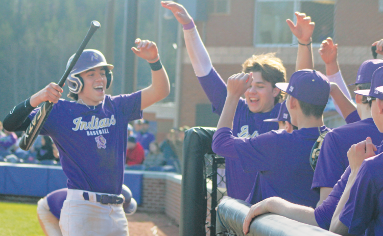 Chase Smith and the purple squad celebrate a run during their preseason game.