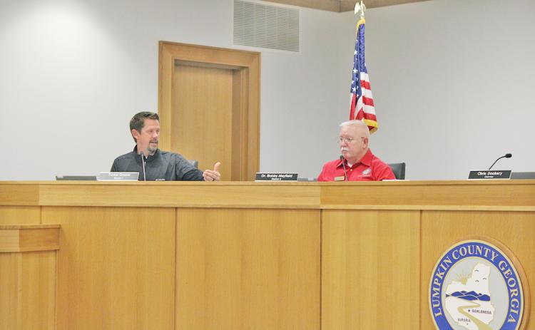 Commissioner Tucker Greene (left), who also served on the County’s recycling committee, elaborates on the group’s recommendations during a recent work session alongside Commissioner Dr. Bobby Mayfield.