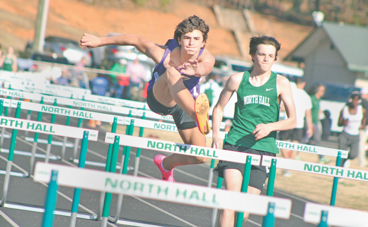 Lumpkin’s MacLane Powell hurdles his way to a first place finish at North Hall.