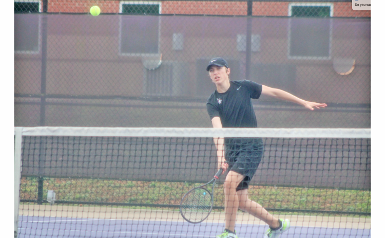 Lumpkin County’s Xander Gaddis returns a ball during the team’s Final Four matchup.
