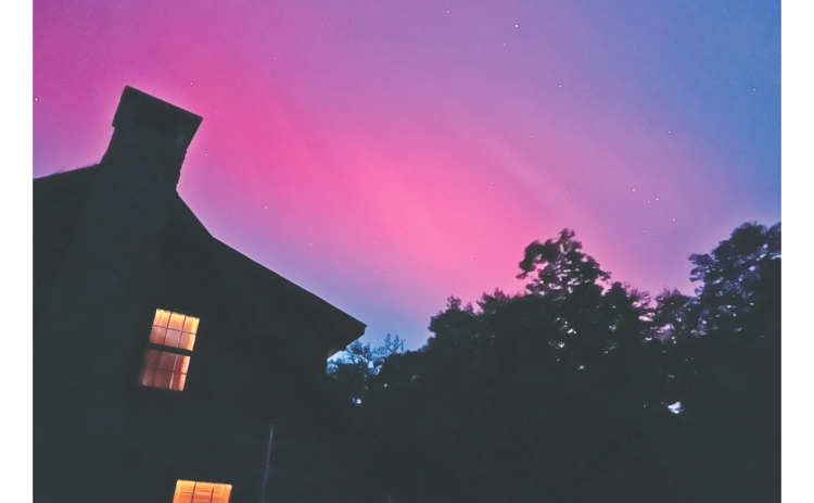 A surprise appearance of the Northern Lights above Lumpkin County resulted in many colorful pictures of the solar storm, including this one by Keith Krayanek who was able to snap a shot of the pinkish tinged-sky over his Ben Higgins Road residence.