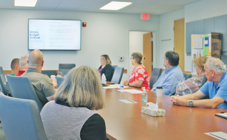 Chestatee Regional Library Director Leslie Clark and Business Manager Jonathan Smith present the local library's 2025 budget outlook to the Lumpkin County Board of Commissioners.