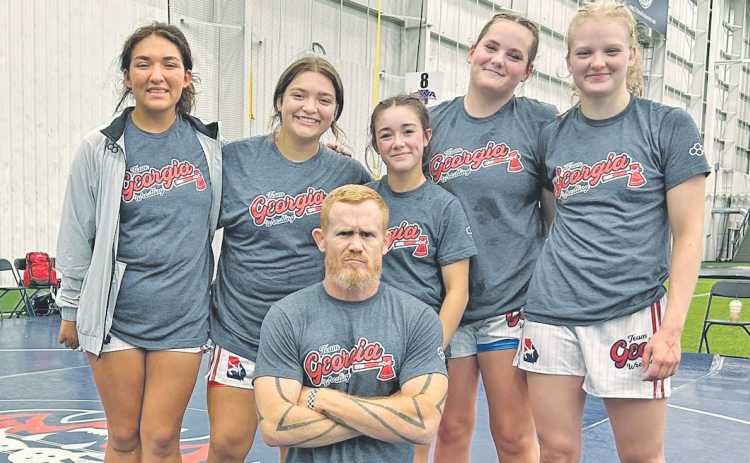 Mattie Mendoza, Natalie Mendoza, Cadence Grulla, Faith Jones, Greta Garbuzovas and Team Alpha Coach Micah Goss represented Lumpkin on the National stage.