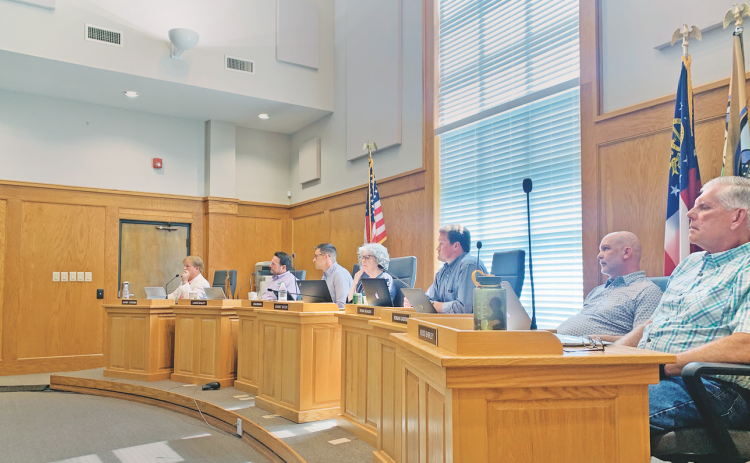 Dahlonega City Council members recently approved a new ordinance that will regulate wall signs while allowing for more freedom for holiday inflatables.