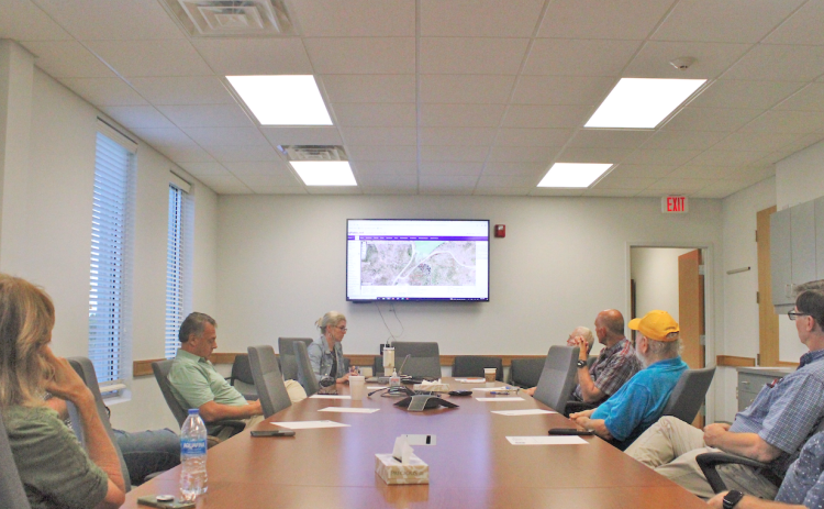 Members of the Yahoola Creek Reservoir Committee met earlier this week to review a revised schematic concept for a new parking area, walking track, pavilion and restrooms to be located off of Rock House Road.