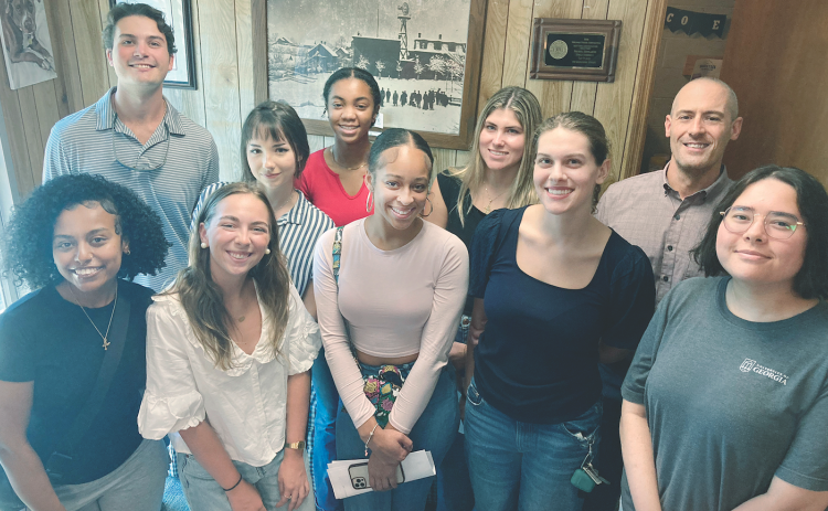 Members of the research team showed up for a meet-and-greet with The Dahlonega Nugget staff on Friday. Pictured are, from left, Samrawit Solomon, Charles Benson, Kerwin Cannon, Katheryn Young, Lauryn Wright, Joyce Bell, Angelina Novelli, Molly Moore, Nugget Publisher John Bynum and Tyler Addison.