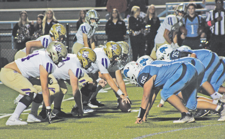 Lumpkin’s Junior Varsity offensive line faces off with Johnson’s Varsity defensive line.