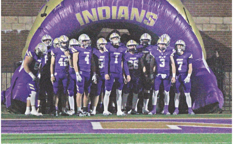The Indians prepare to storm the field together ahead of their State Playoff game against LaGrange last Friday.