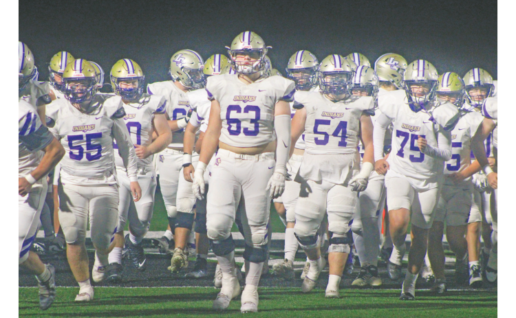 Zeke Cochran takes the field backed by the rest of the Indians at this week’s game in Pickens County.